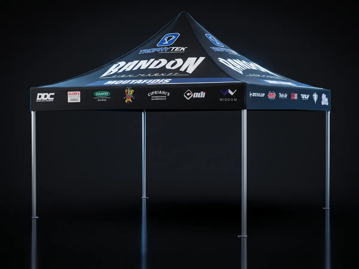Custom printed 10x10 race canopy with sponsor logos, built by Trophy Tek